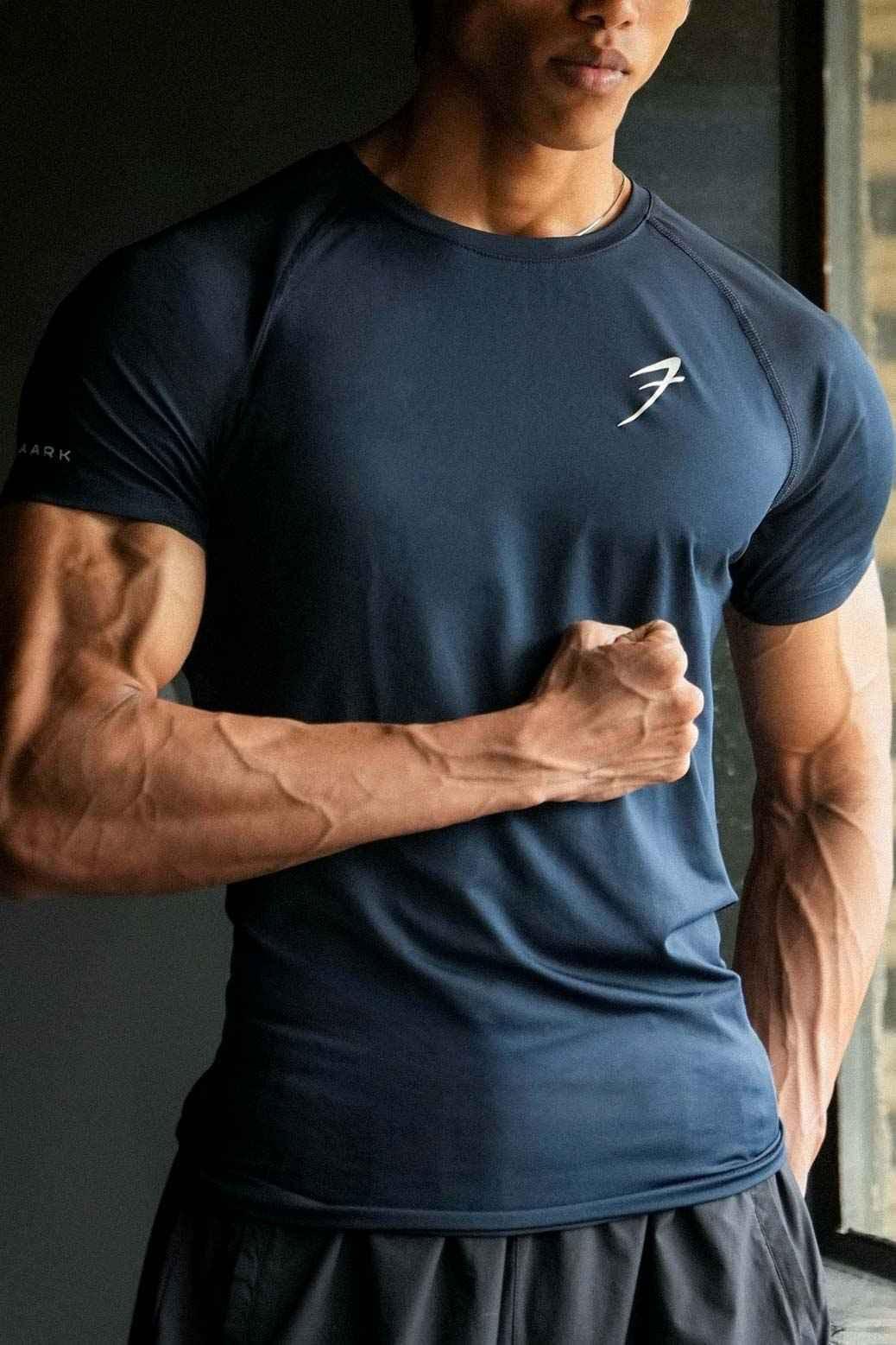 Urban Navy T-Shirt by Fuaark Nz, casual unisex T-shirt with trendy urban style, shown on a model.