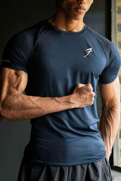 Urban Navy T-Shirt by Fuaark Nz, casual unisex T-shirt with trendy urban style, shown on a model.
