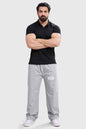 Black Wave Polo T-shirt by Fuaark Nz, showcasing a casual fit with a stylish wave design on the front.