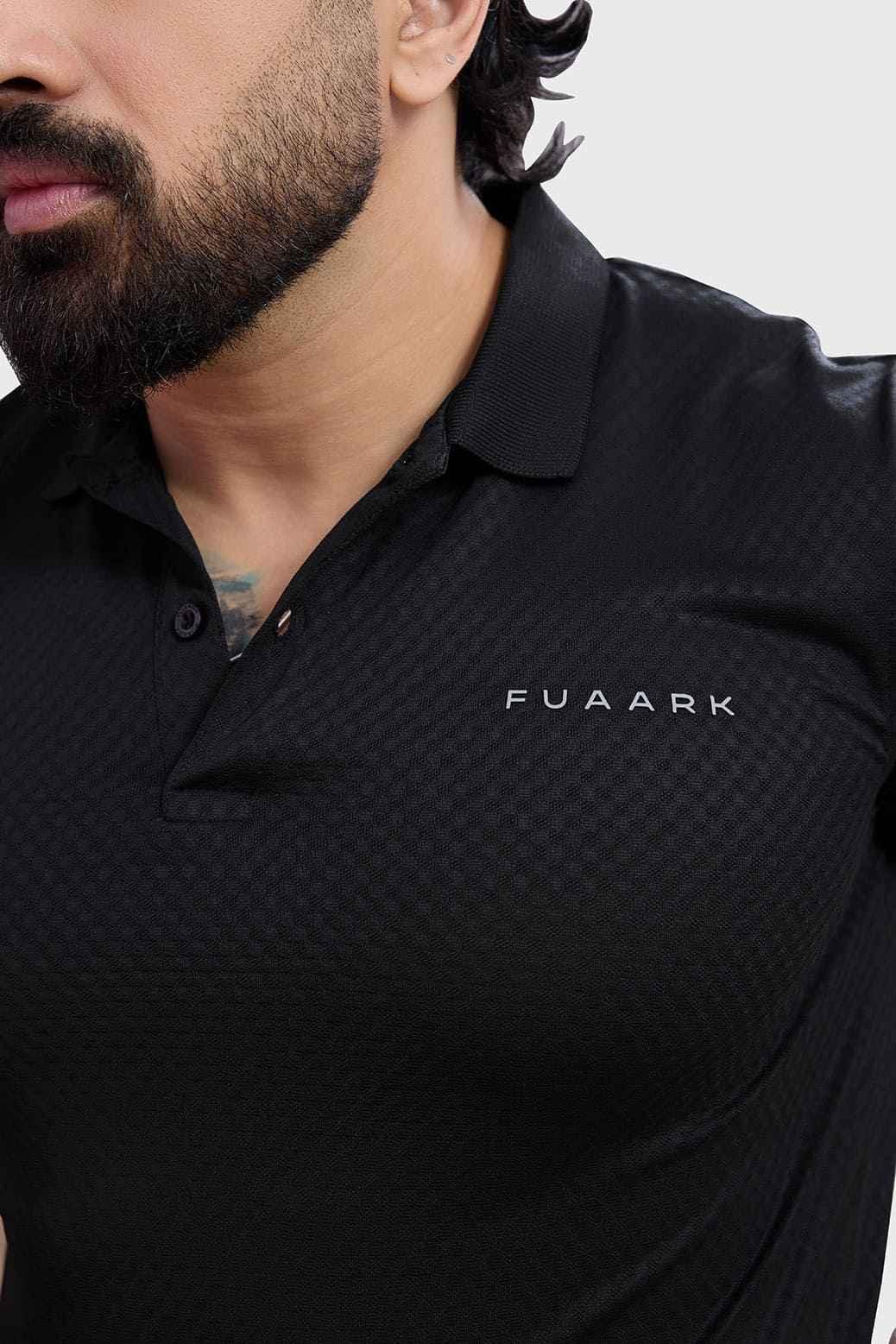 Black Wave Polo T-shirt by Fuaark Nz, featuring a classic fit and subtle wave design, displayed on a plain background.