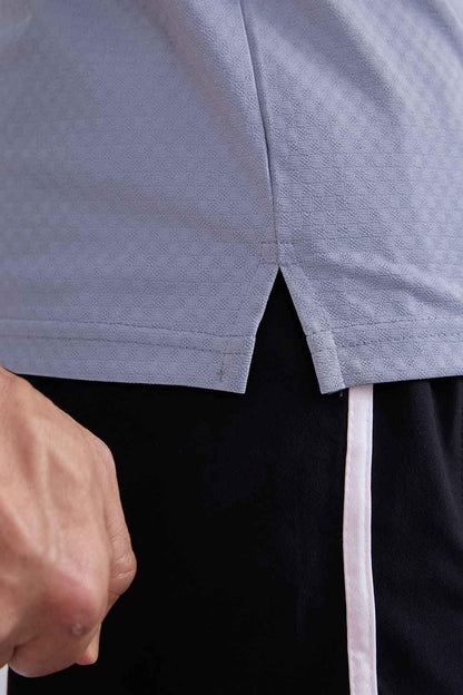 Grey Wave Polo T-shirt by Fuaark Nz, casual men's T-shirt with a stylish wave design, made from soft fabric.
