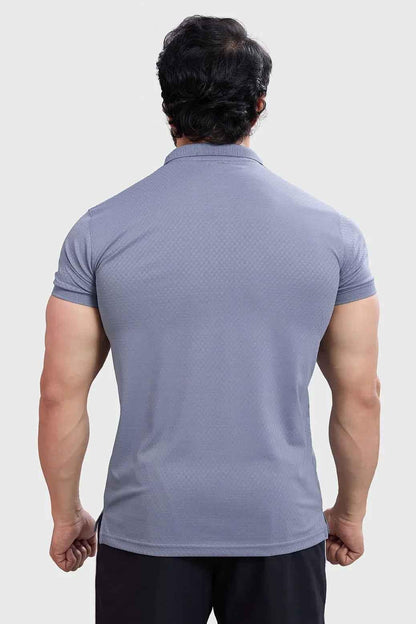 Grey Wave Polo T-shirt by Fuaark Nz, showcasing a classic fit with a subtle wave design on the front.