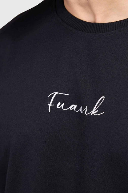Black oversized T-shirt by Fuaark Nz featuring bold text design, casual fit, and comfortable fabric for effortless style.