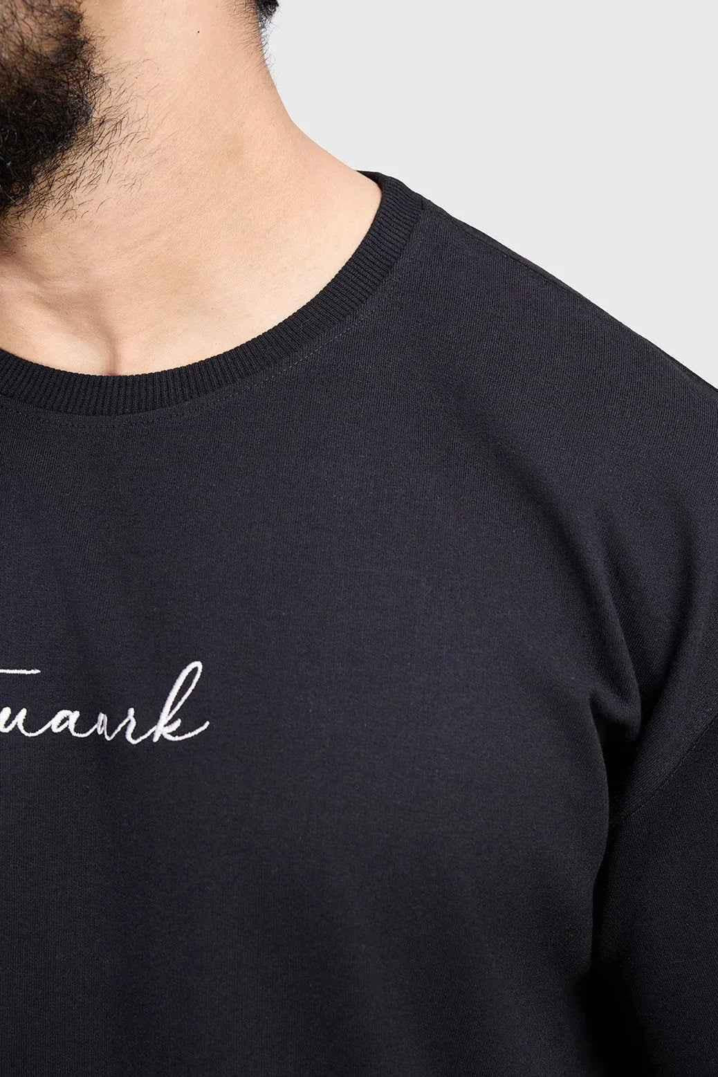 Black oversized T-shirt by Fuaark Nz, featuring bold design, casual fit, and soft fabric for effortless style and comfort.
