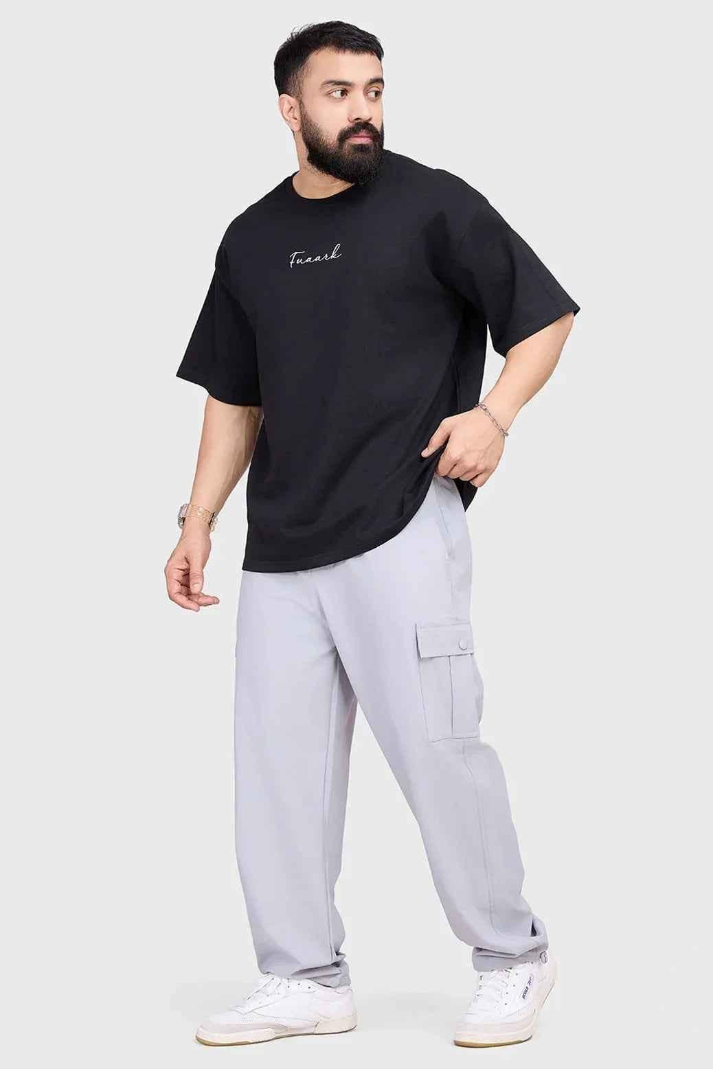 Black oversized T-shirt from Fuaark Nz, showcasing a relaxed fit and casual style, perfect for effortless comfort and everyday wear.