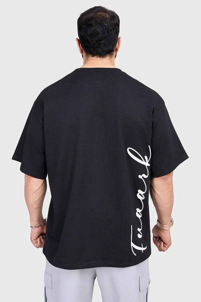 Black oversized T-shirt by Fuaark Nz with bold design, casual fit, and comfortable style, shown flat on a white background.