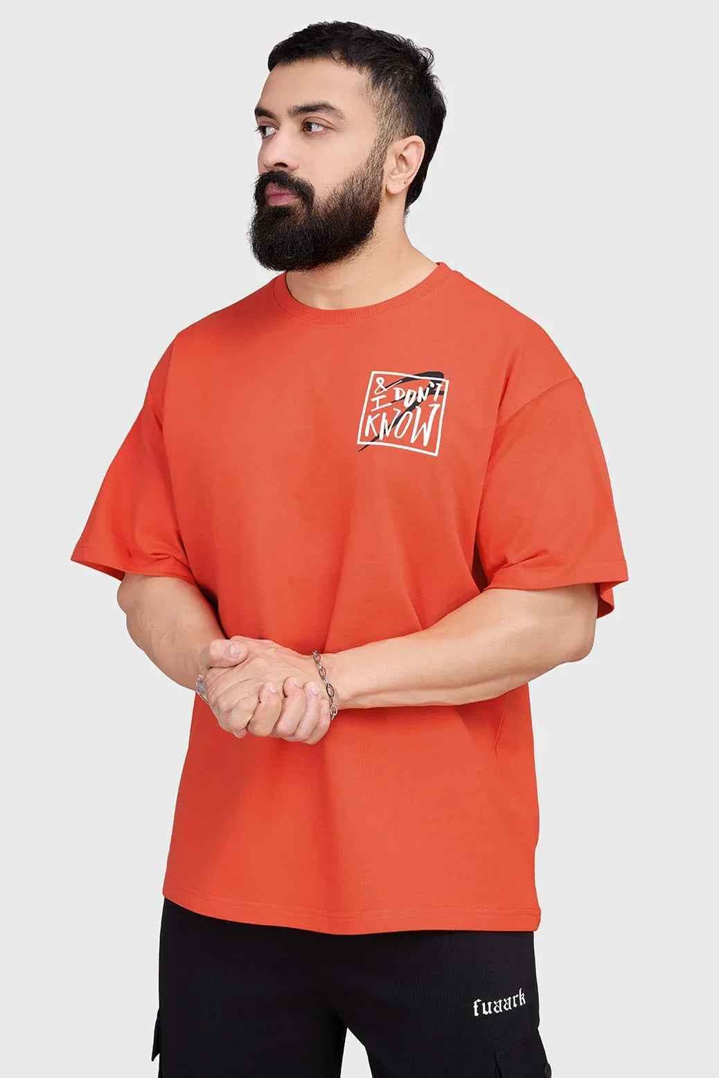Orange oversized T-shirt by Fuaark Nz, premium cotton, relaxed fit, unisex streetwear style, casual and comfortable.