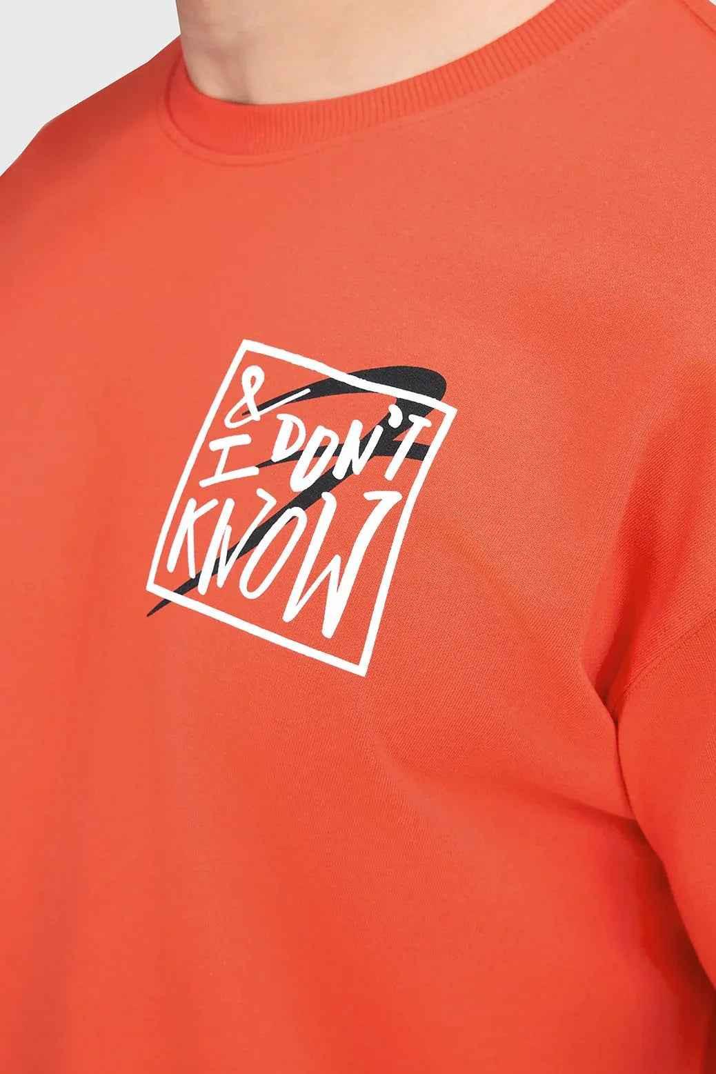 Orange oversized T-shirt by Fuaark Nz, made from premium cotton with a relaxed fit, unisex streetwear style.
