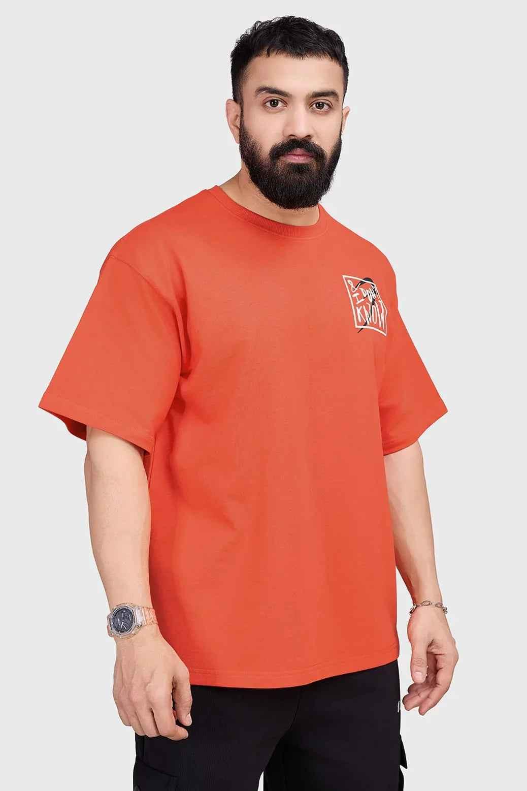 Orange oversized T-shirt by Fuaark Nz with relaxed fit, premium cotton, unisex streetwear style, casual and comfortable.