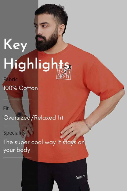 Orange oversized T-shirt by Fuaark Nz, premium cotton, relaxed fit, unisex streetwear style, casual and comfortable look.