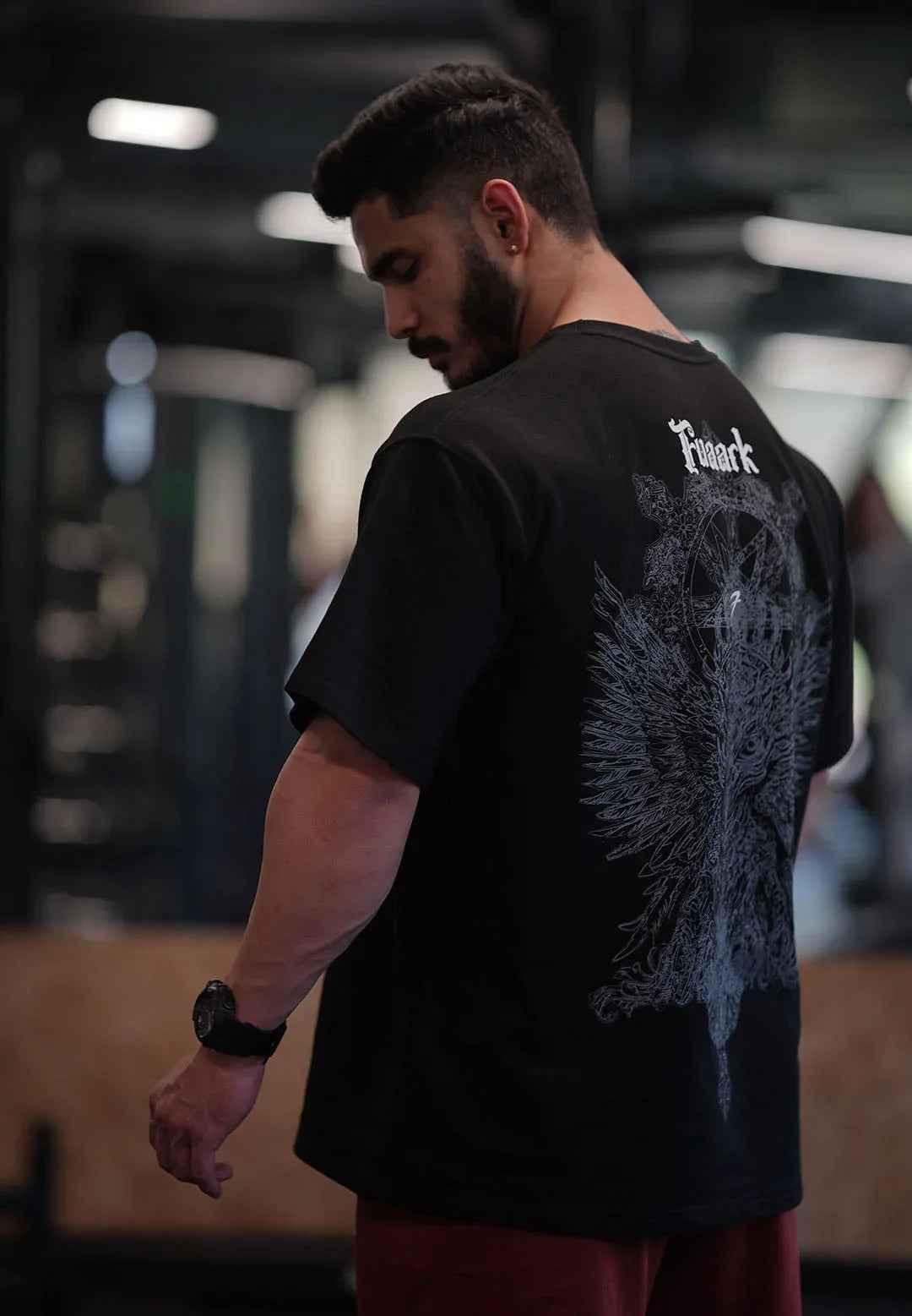 Black oversized Eagle T-shirt by Fuaark Nz, featuring a relaxed fit and bold eagle graphic for comfortable, stylish casual wear.