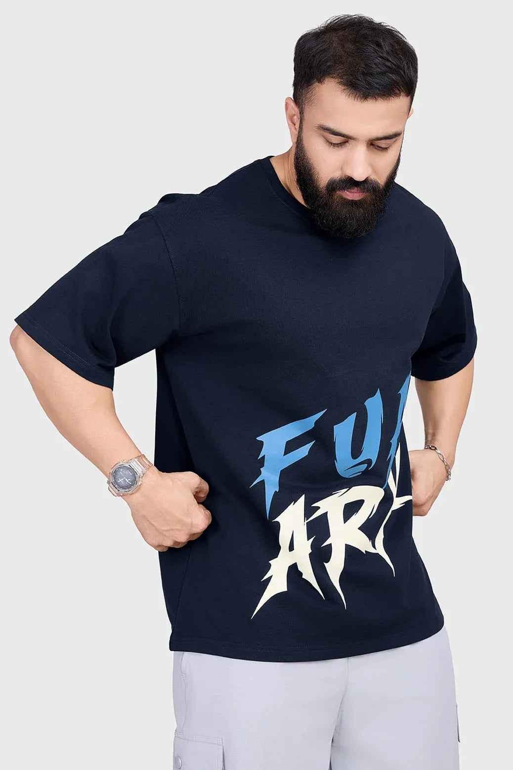 Navy oversized T-shirt for men by Fuaark Nz, featuring a relaxed fit and casual style, shown on a model.
