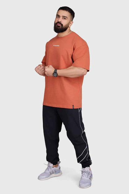 Fuaark Nz oversized rust T-shirt for men, soft cotton fabric, relaxed fit, casual style, perfect for comfortable everyday wear