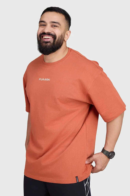 Fuaark Nz oversized rust T-shirt for men, featuring a relaxed fit and soft fabric for comfort and casual style.