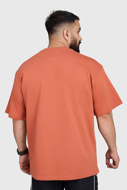 Fuaark Nz oversized rust T-shirt for men, featuring a relaxed fit and soft fabric for ultimate comfort and casual style.