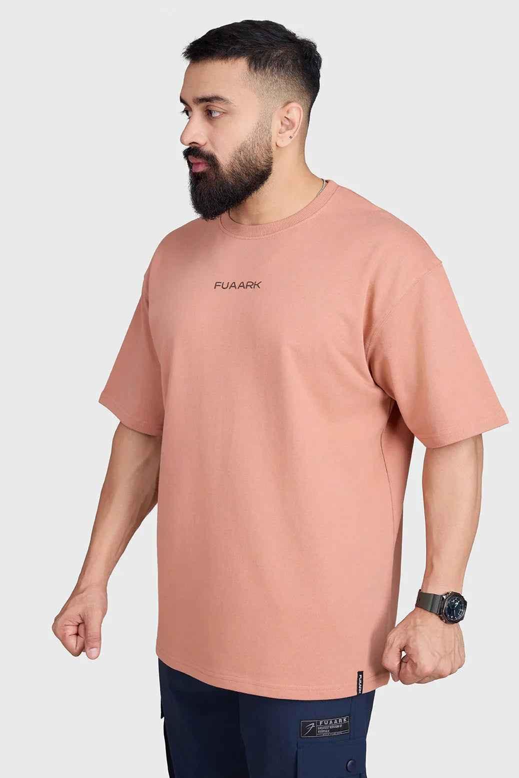 Fuaark Nz Element Oversized T-shirt in warm beige, casual fit, soft fabric, displayed on a hanger.