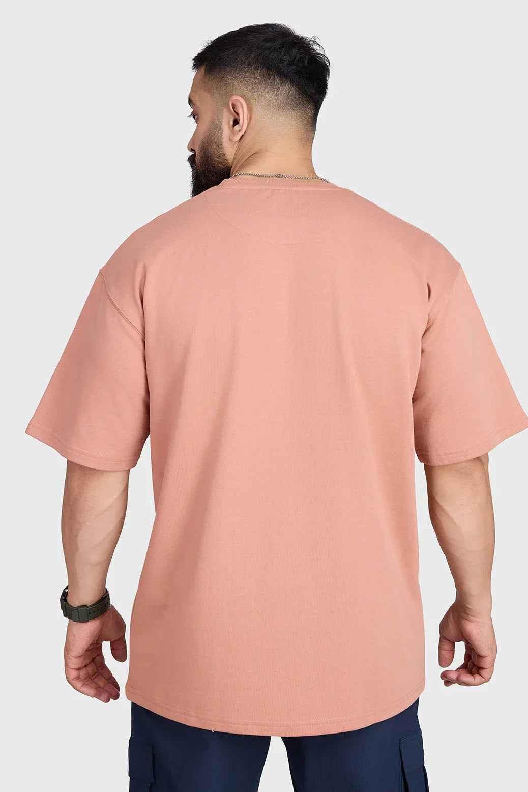 Fuaark NZ Element oversized T-shirt in warm beige, showing the relaxed fit and soft fabric on a flat lay.