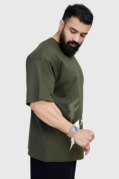 Oversized olive T-shirt by Fuaark NZ, casual fit with soft fabric and relaxed style, shown on a model.