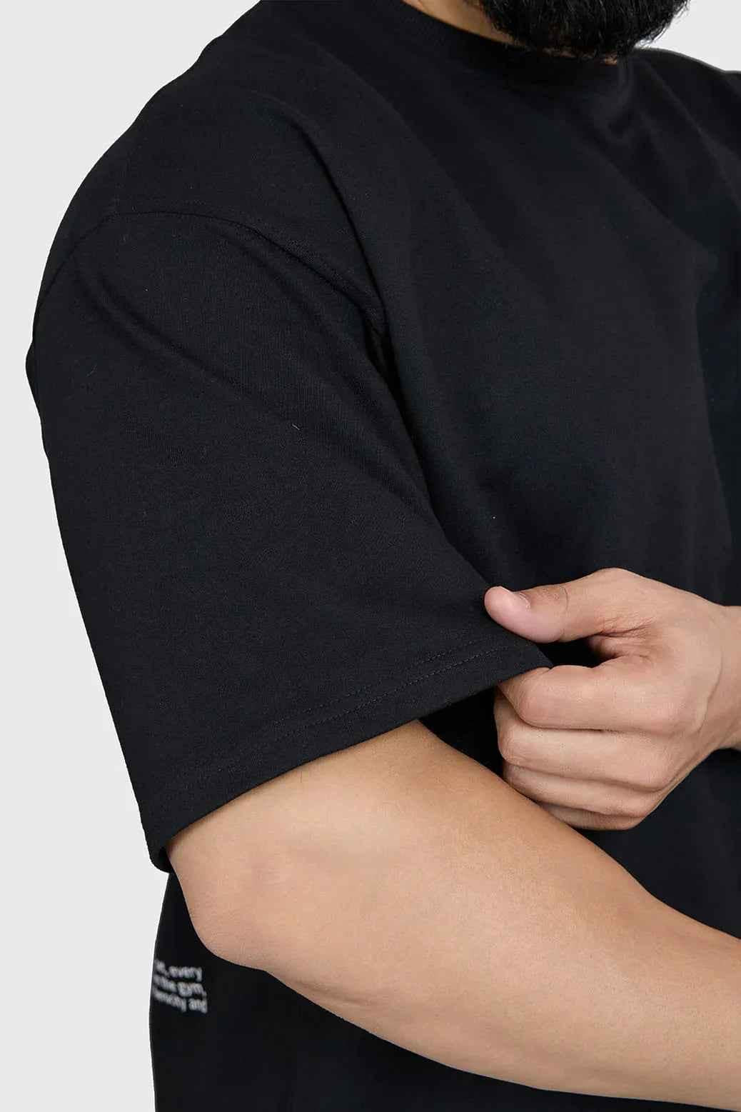 Black Fuaark Nz oversized Bull T-shirt with bold graphic design, casual streetwear style, front view.