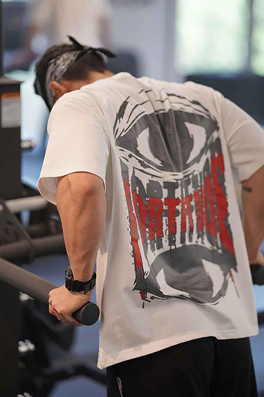 White Fortitude Oversized T-shirt by Fuaark Nz, showing a relaxed fit and casual style in a close-up view.