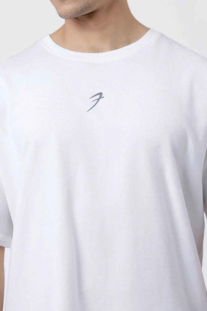 White oversized Fortitude T-shirt by Fuaark Nz featuring a relaxed fit and casual style, shown on a plain background.