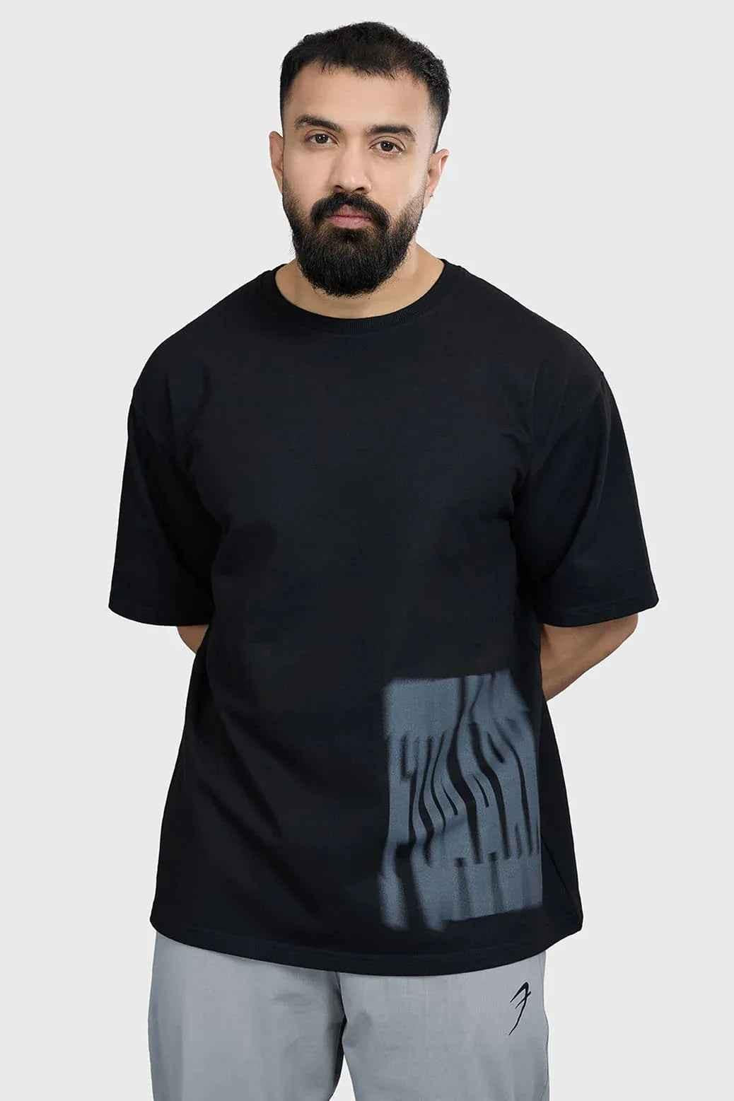 Fuaark Nz oversized black T-shirt with a relaxed streetwear fit, premium heavyweight fabric, featuring a gorilla graphic design.