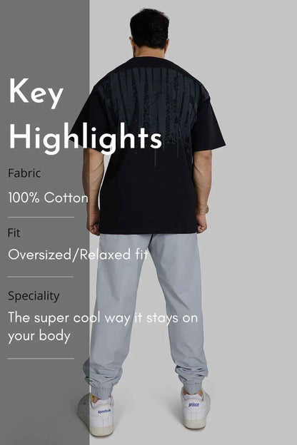 Fuaark Nz heavyweight oversized black T-shirt for men, casual style, soft fabric, and comfortable fit.