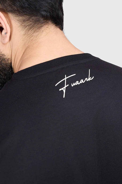 Black Hustle oversized T-shirt by Fuaark Nz, featuring a relaxed fit and casual style, shown on a plain background.