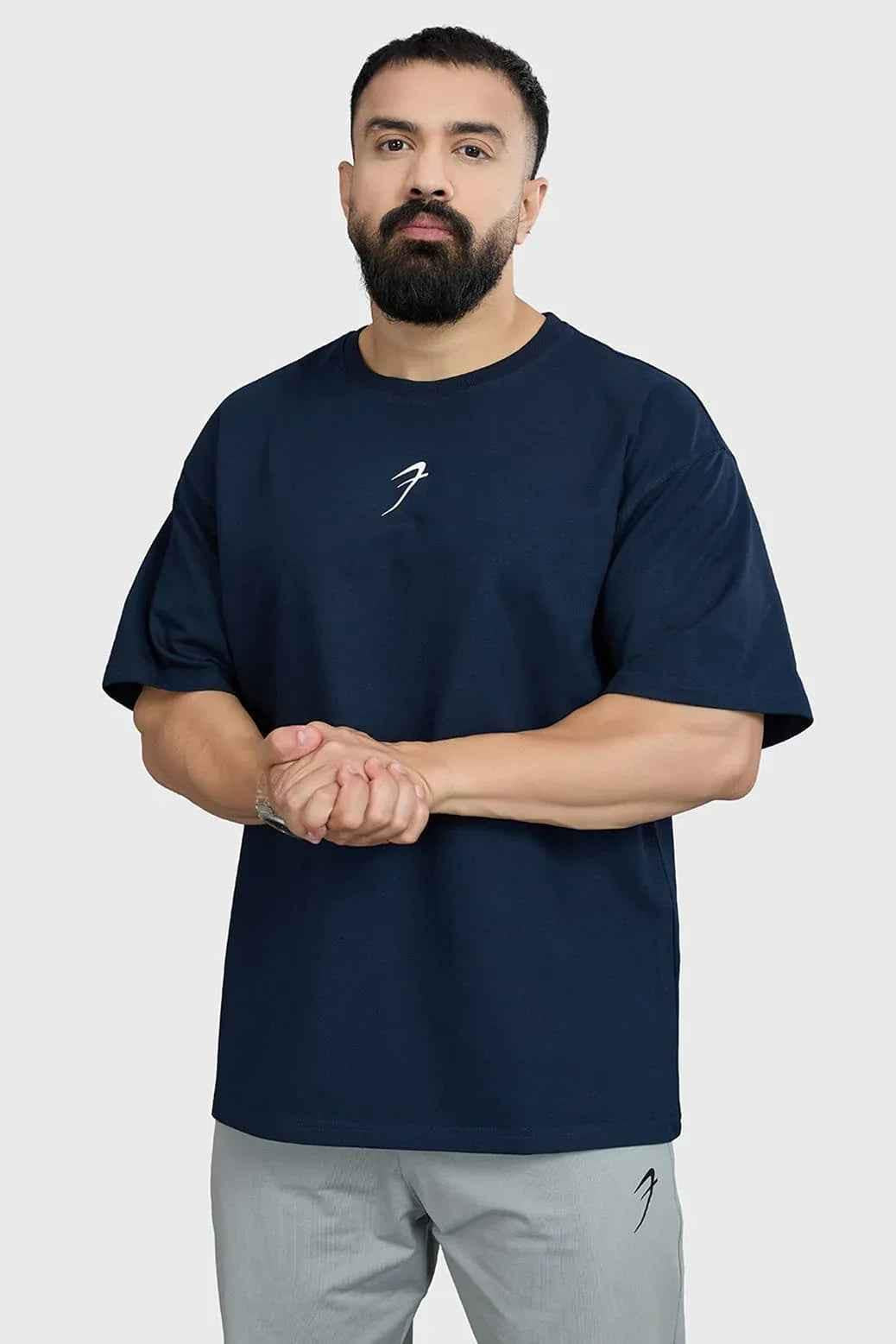 Navy Ignite Oversized T-shirt by Fuaark Nz, featuring a relaxed fit and soft cotton fabric, casual streetwear style.