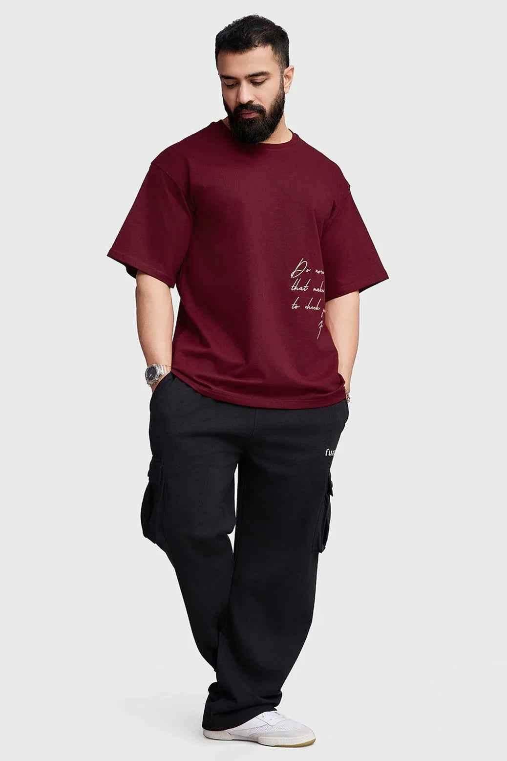 Maroon oversized T-shirt by Fuaark Nz featuring a casual, relaxed fit for effortless style and comfort.
