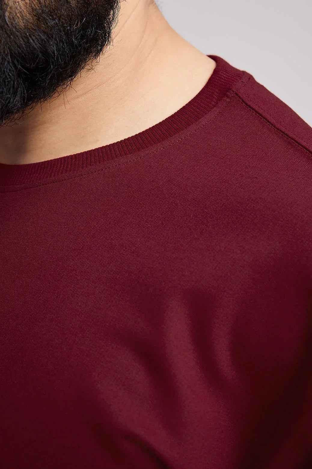 Maroon oversized T-shirt from Fuaark Nz featuring a relaxed fit and stylish design, perfect for effortless casual wear.