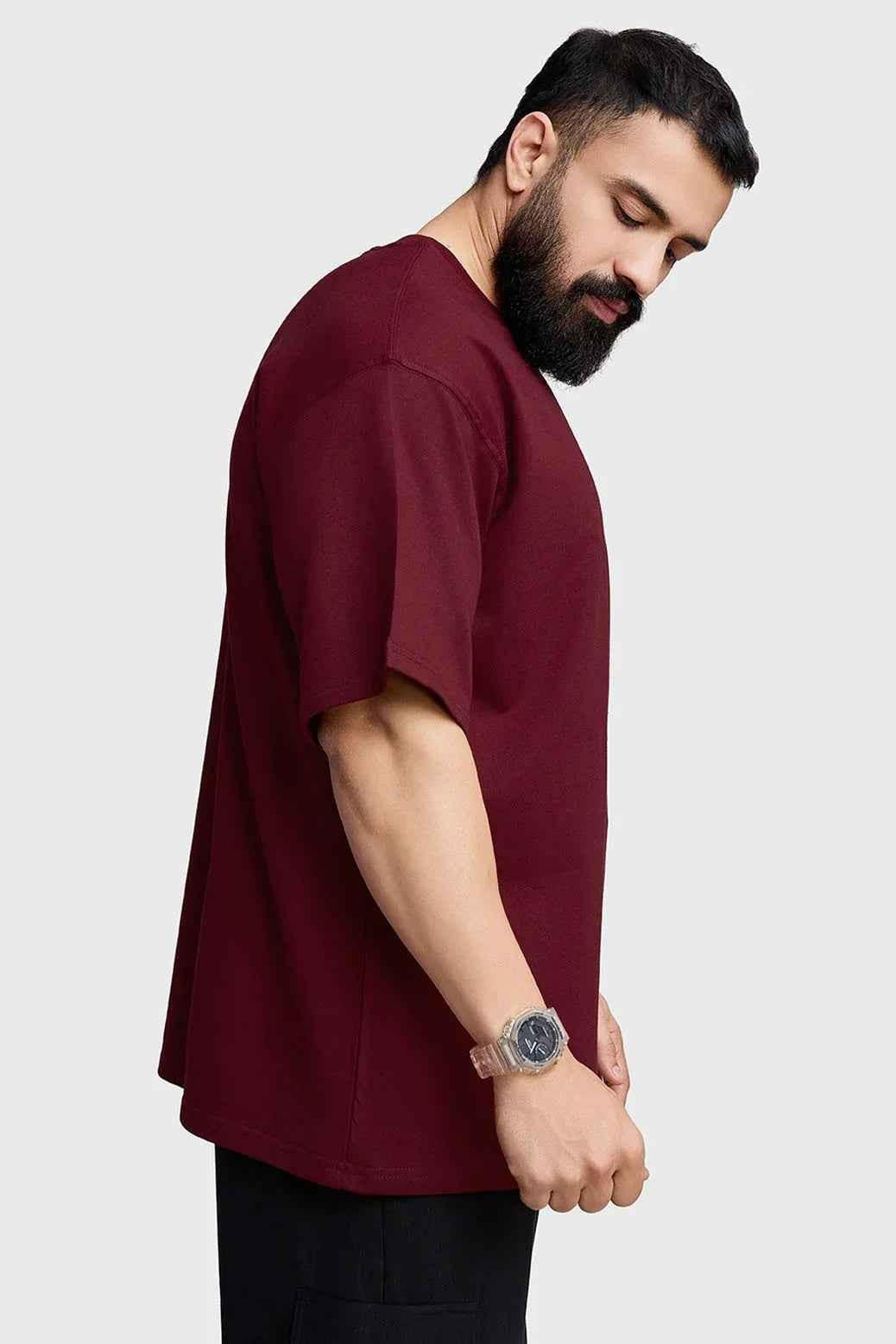 Maroon oversized T-shirt for women by Fuaark Nz, featuring a relaxed fit and stylish design for effortless casual wear.