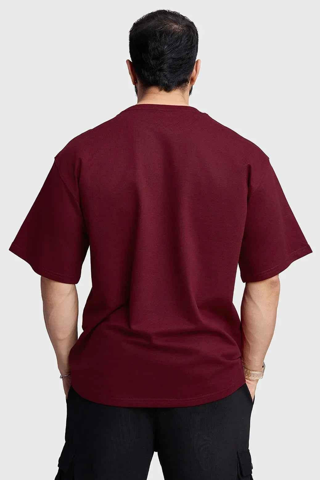 Maroon oversized T-shirt from Fuaark Nz with "Inspiration" graphic, casual fit, perfect for effortless style.
