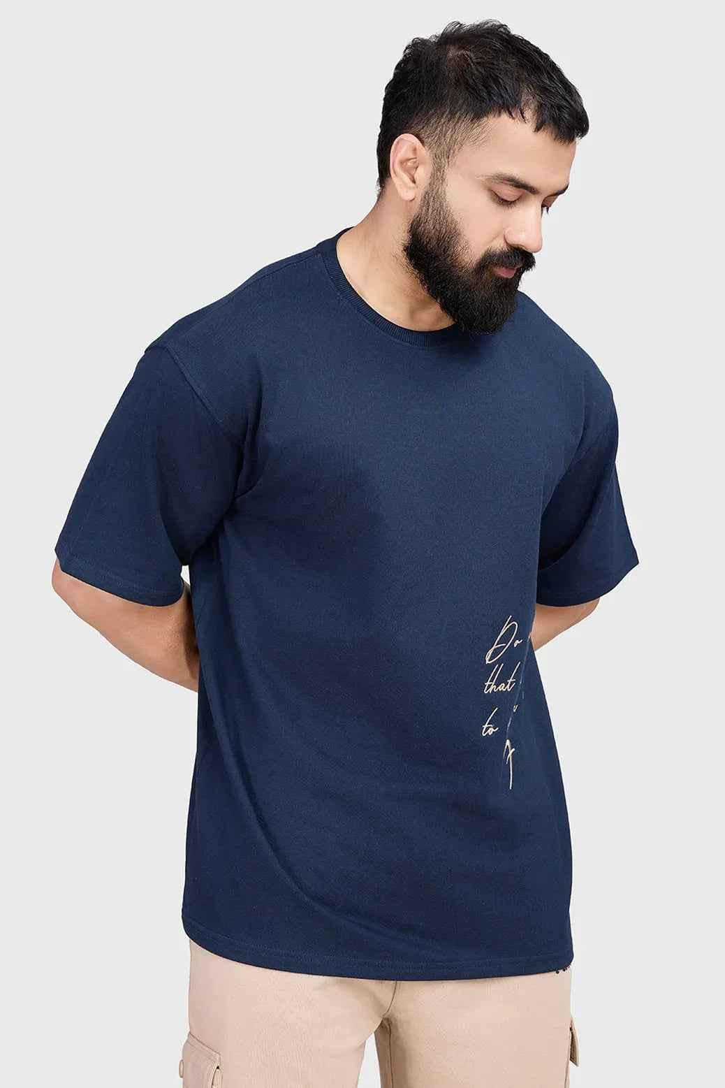 Navy Inspiration oversized T-shirt by Fuaark Nz, casual fit, soft fabric, front graphic design, displayed on a hanger.