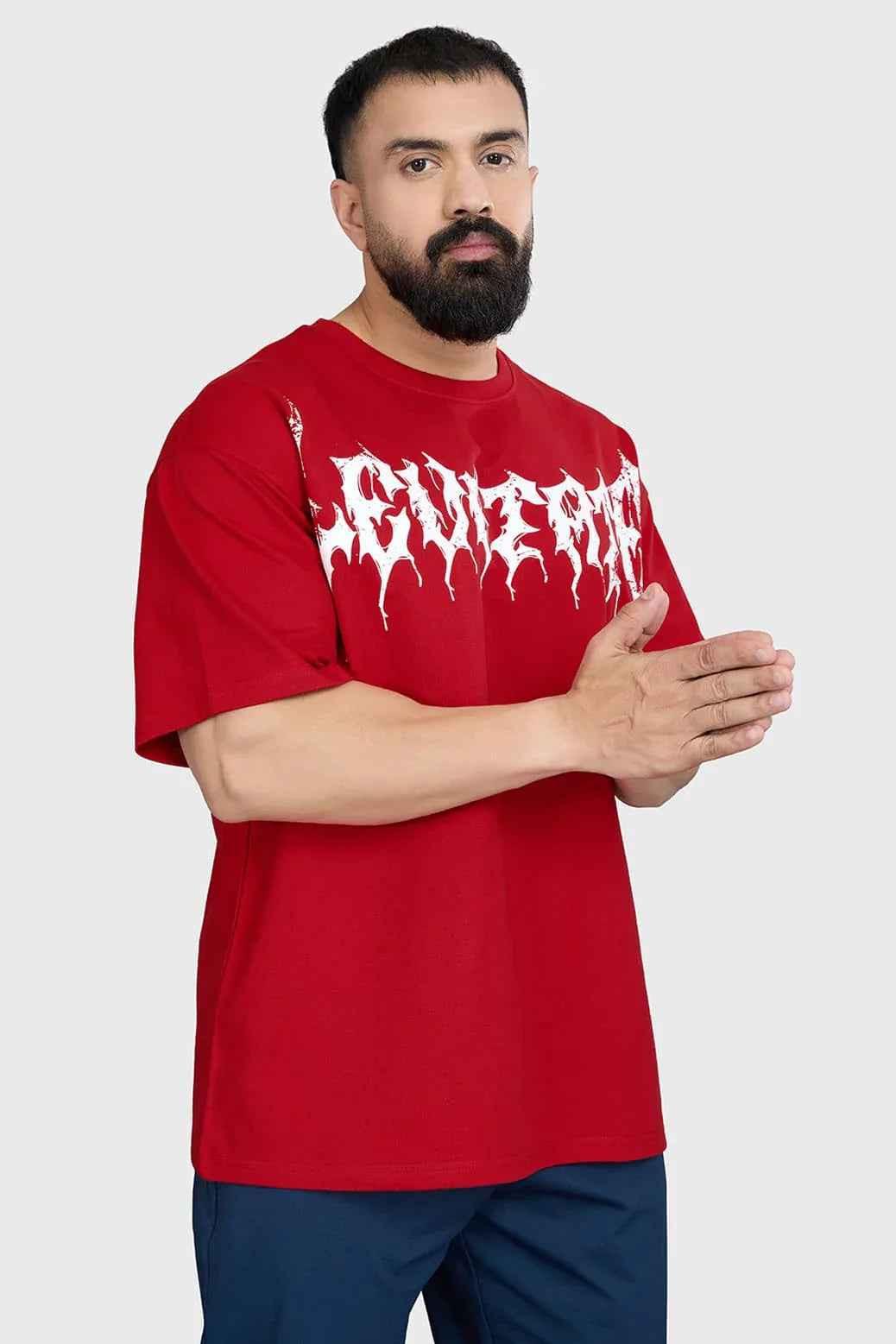Red Levitate Oversized T-shirt from Fuaark Nz, showing the relaxed fit and bold design on soft cotton fabric.