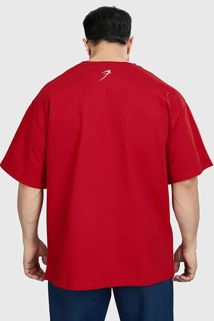 Red Levitate oversized T-shirt by Fuaark Nz, featuring a relaxed fit and bold design, worn by a model showcasing casual style.