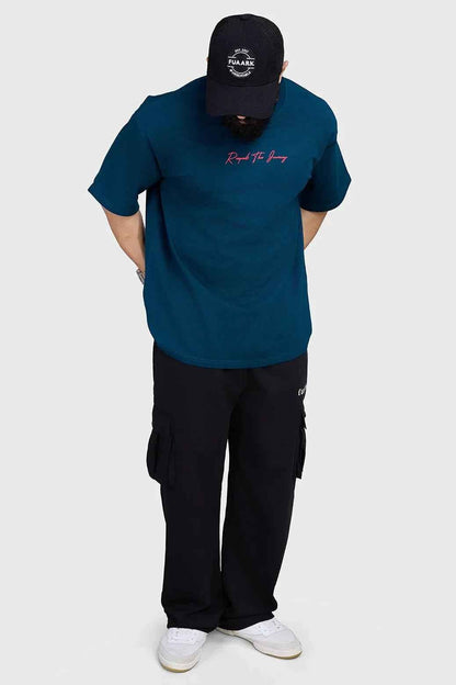 Fuaark Nz Respect The Journey oversized teal T-shirt, casual fit, soft fabric, stylish design, front graphic, short sleeves.