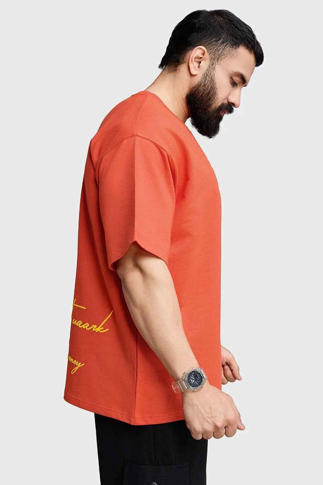 Orange oversized T-shirt by Fuaark Nz with "Respect The Journey" graphic, casual fit, and comfortable fabric.