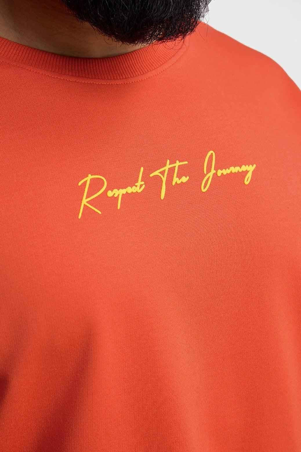 Orange oversized T-shirt from Fuaark Nz with "Respect The Journey" print, casual style, shown on a plain background.