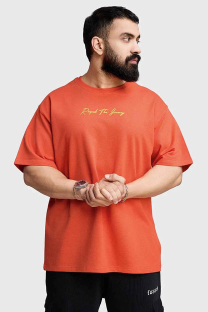 Orange oversized T-shirt from Fuaark Nz with "Respect The Journey" print, casual fit, and comfortable fabric.