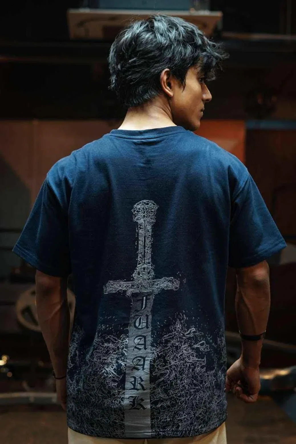 Navy oversized T-shirt by Fuaark Nz featuring a sword graphic design, casual fit, and soft cotton fabric.