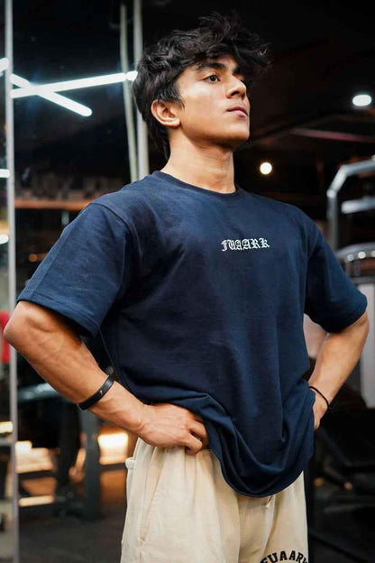 Navy oversized T-shirt from Fuaark Nz featuring a bold sword graphic on the front, casual and comfortable fit.
