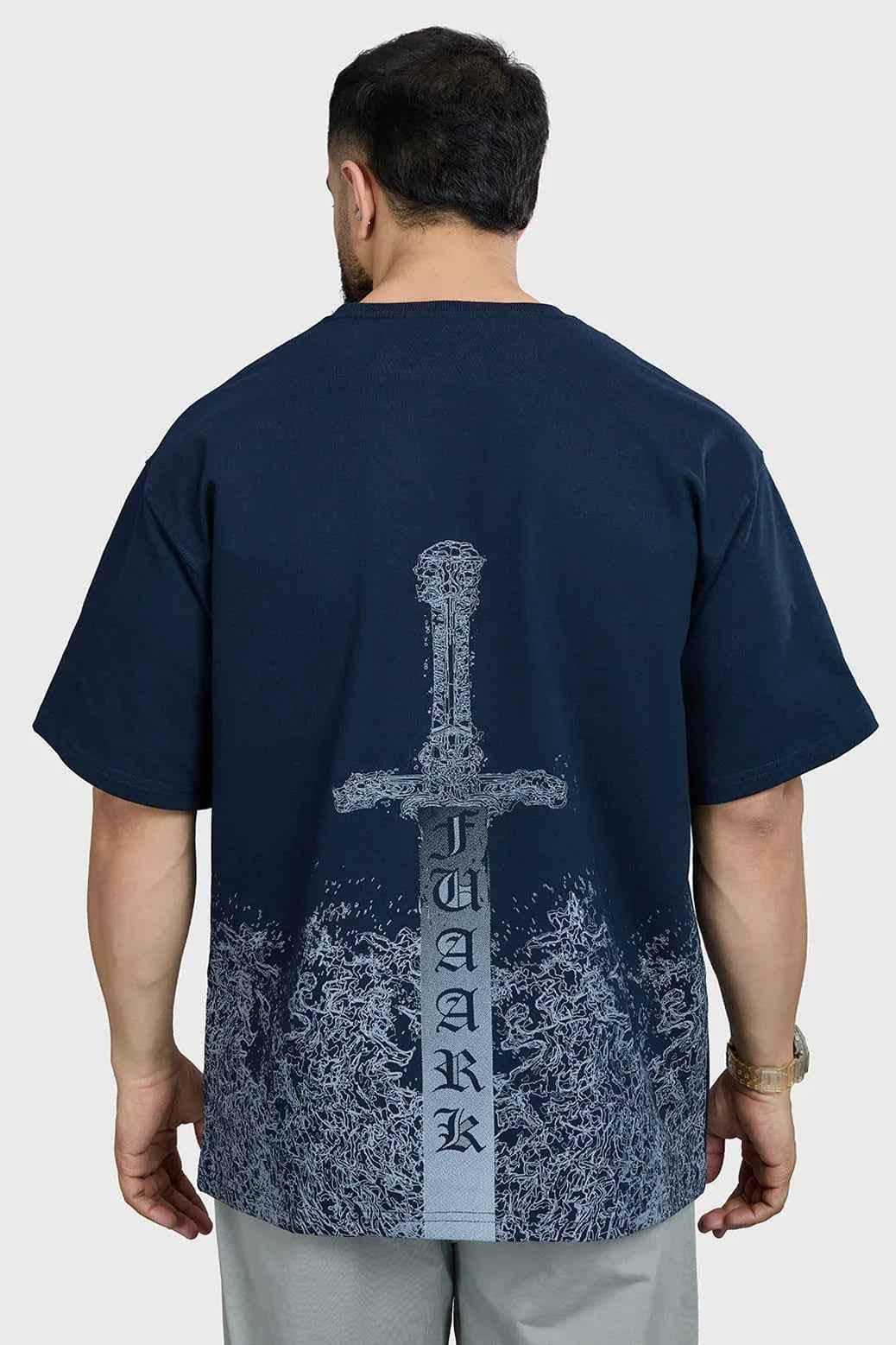 Navy oversized T-shirt from Fuaark Nz featuring a bold sword graphic on soft cotton fabric.