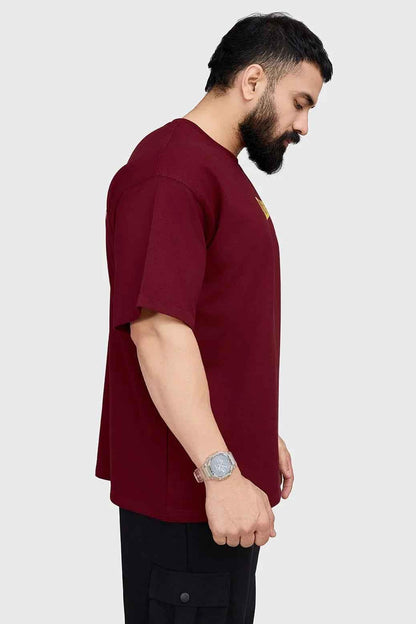 Fuaark Nz oversized maroon T-shirt, trendy unisex t-shirt with a relaxed fit and stylish design for casual wear.