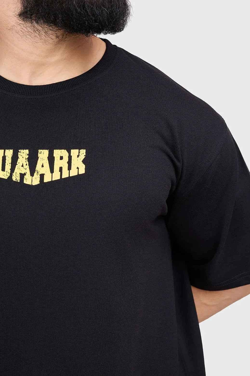 Black Trendsetter Oversized T-shirt by Fuaark Nz, featuring a relaxed fit and casual style, displayed on a plain background.