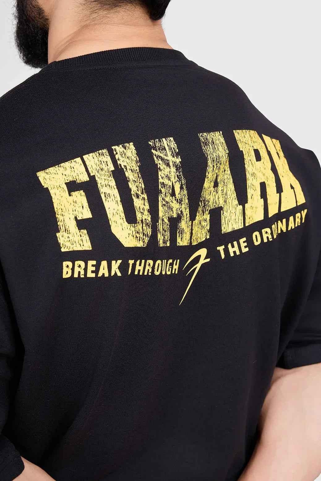 Black Trendsetter oversized T-shirt by Fuaark Nz, showcasing a relaxed fit and casual style on a plain background.