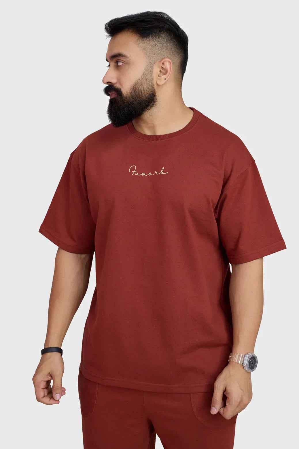 Rust-colored oversized T-shirt from Fuaark NZ, designed for ultimate comfort, featuring a relaxed fit and casual style.