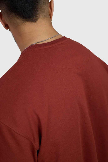 Rust-colored oversized T-shirt for women by Fuaark Nz, featuring a relaxed fit and casual style.