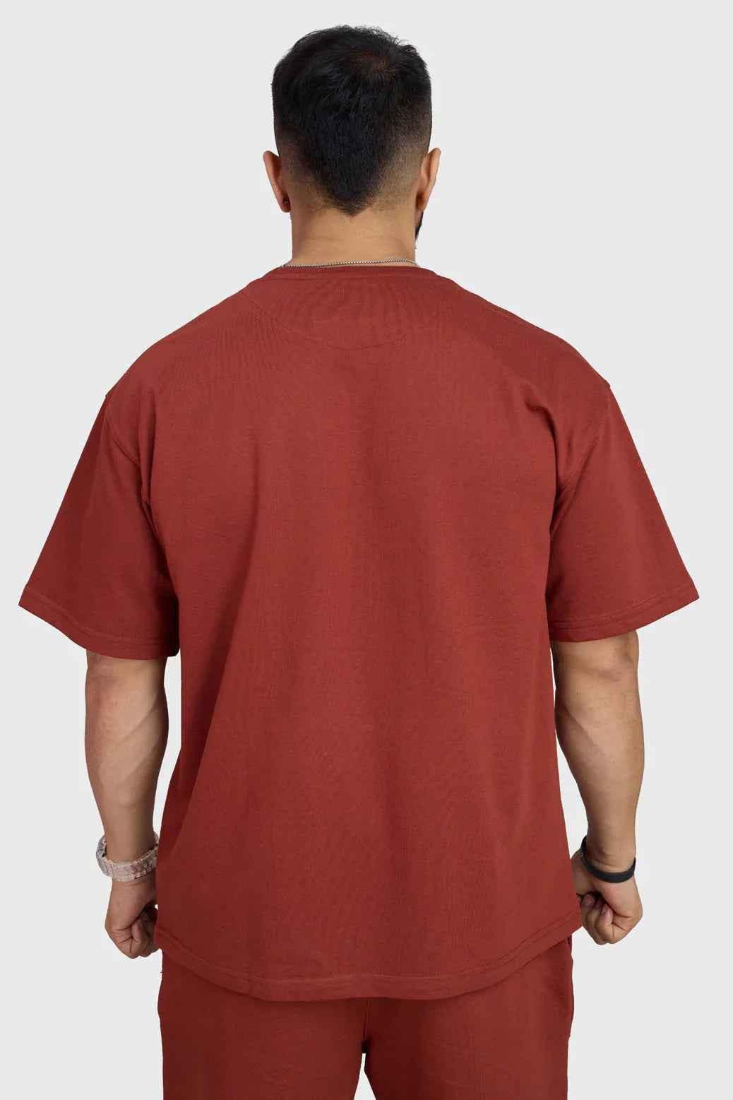 Rust-colored Fuaark Nz oversized T-shirt for women, featuring a relaxed fit and casual style perfect for weekend comfort.