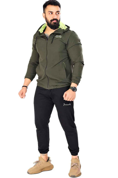 Fuaark Nz Velocity Jacket in olive, a lightweight windbreaker with a sleek design, suitable for outdoor activities.
